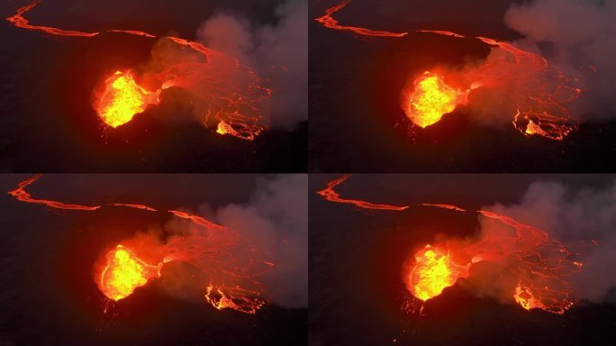 火山喷发在冰岛，流动的红色热熔岩河，令人难以置信的自然现象，壮观的空中壮观的Litli hurutu