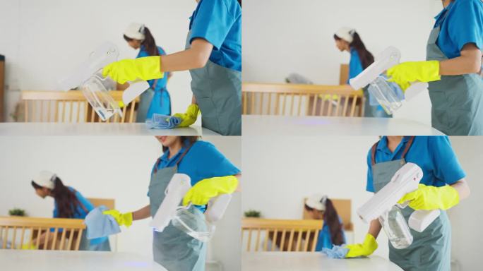在服务期间，管家或女佣用手持工具近距离向客户房间的洁净室喷洒清洁化学品。