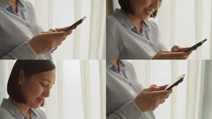 一个女人的手在操作智能手机