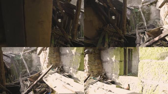 被遗弃的老房子在背光下散落着碎片和碎石。