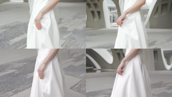 女人拎起白色裙摆衣服