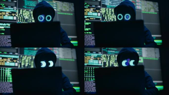戴面具的匿名黑客侵入数据服务器，用病毒感染系统