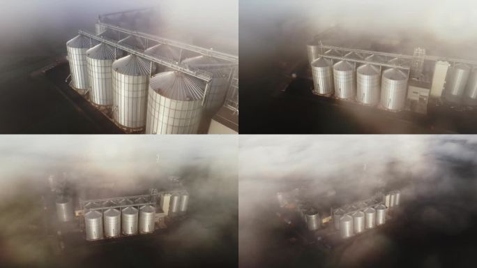 无人机在农村农场的筒仓上拍摄雾