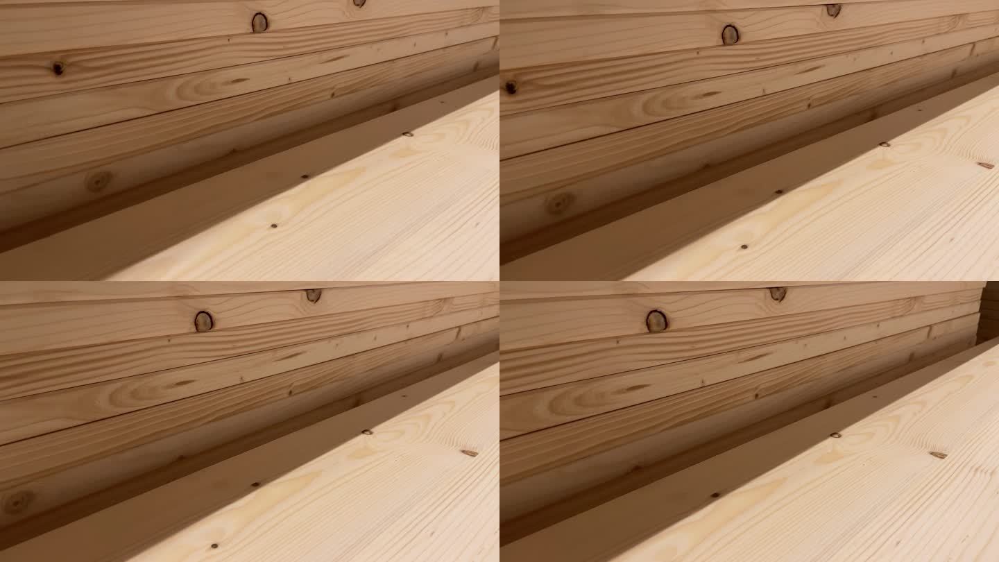 长杉木木板堆放在木工店或工业仓库的架子上的长杉木木板