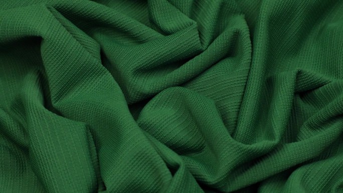 绿色织物。织物的背景。布。