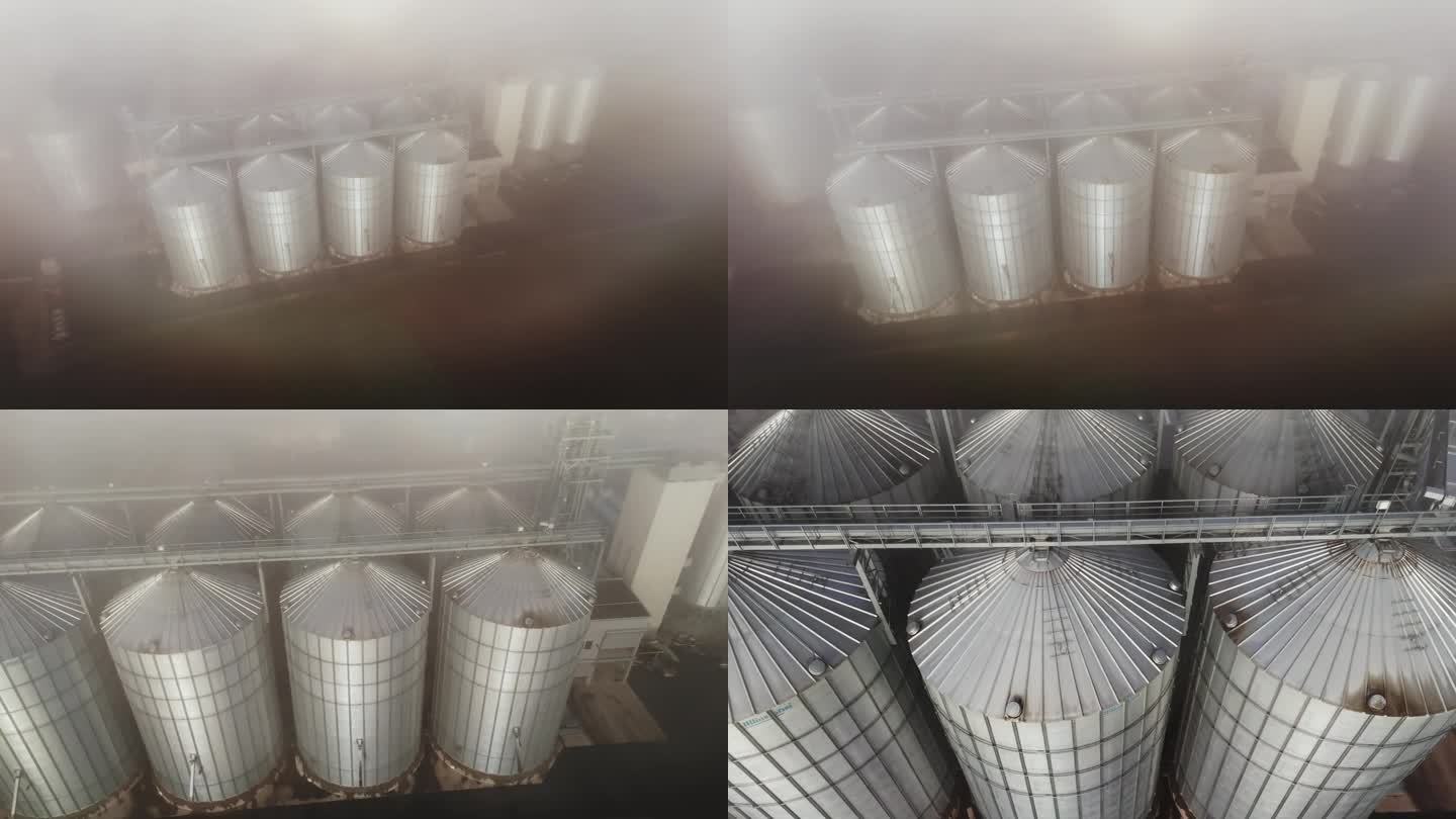 无人机在农村农场的筒仓上拍摄了空灵的雾