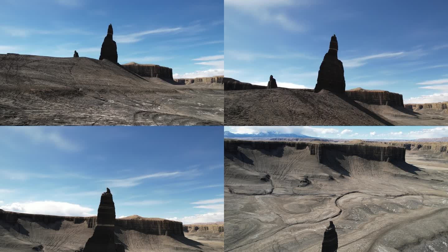 无人机拍摄的长洞银，黑色砂岩尖顶岩层在美国犹他州的景观