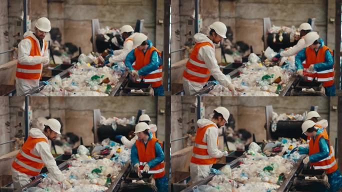 在垃圾回收厂，三名身穿白色制服、身穿橙色背心的工人在传送带旁拣垃圾，传送带将塑料瓶按颜色分装到合适的