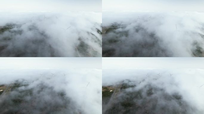 无人机在马德拉山的云中飞过风力发电机转子