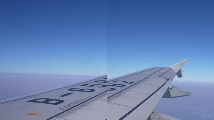 飞机高空穿越云层飞行旅游  竖屏素材