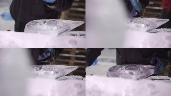 特写的冰雕研磨塑造冰的细节