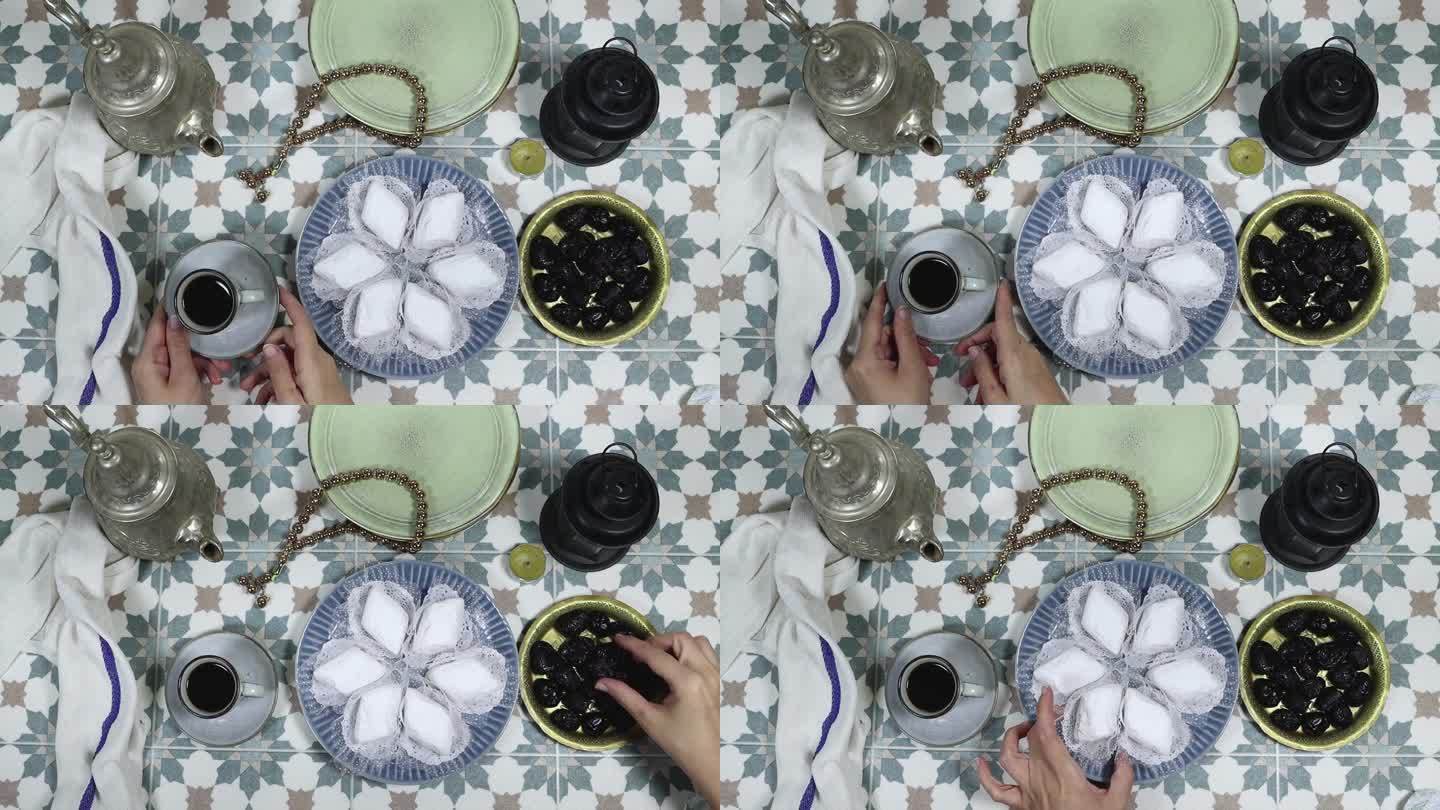 开斋节或开斋节，斋月概念开斋和早餐。妇女们喝着咖啡，吃着由杏仁糊制成的阿尔及利亚饼干，上面覆盖着糖粉