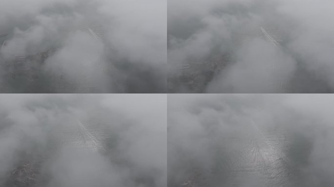 航拍山东威海平流雾之中的刘公岛