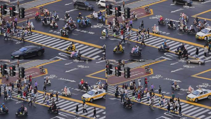 繁华街道路口斑马线人群过马路