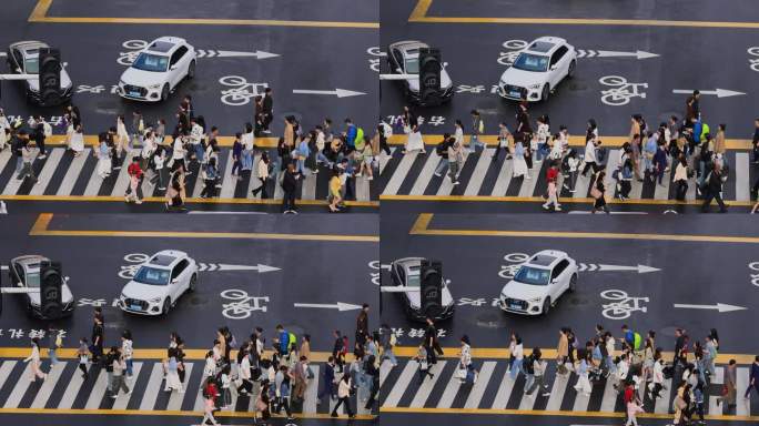 繁华街道路口斑马线人群过马路