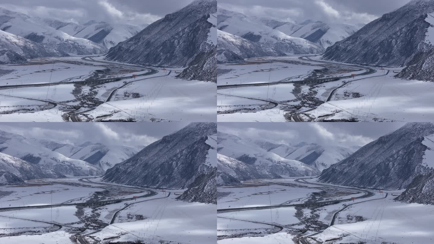 西藏旅行雪景公路航拍缓慢环绕视频