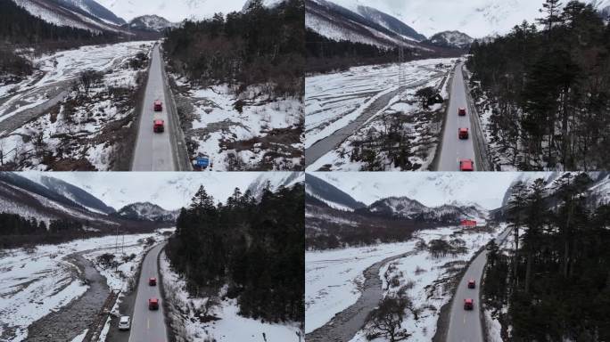 西藏旅行越野车自驾航拍雪山公路跟随视频