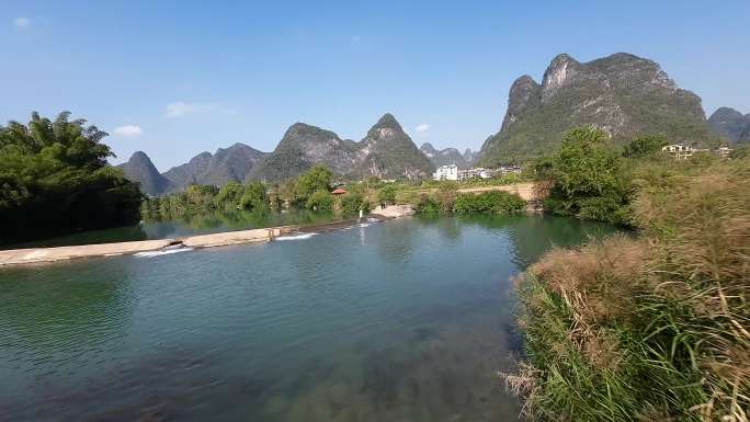 桂林山水阳朔水面穿越机拍摄环绕贴水