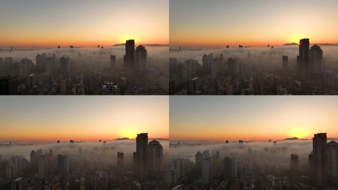 城市市中心清晨日出朝霞平流雾
