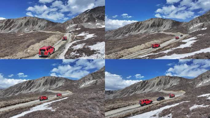 4K航拍坦克300越野车行驶在雪地的甘孜