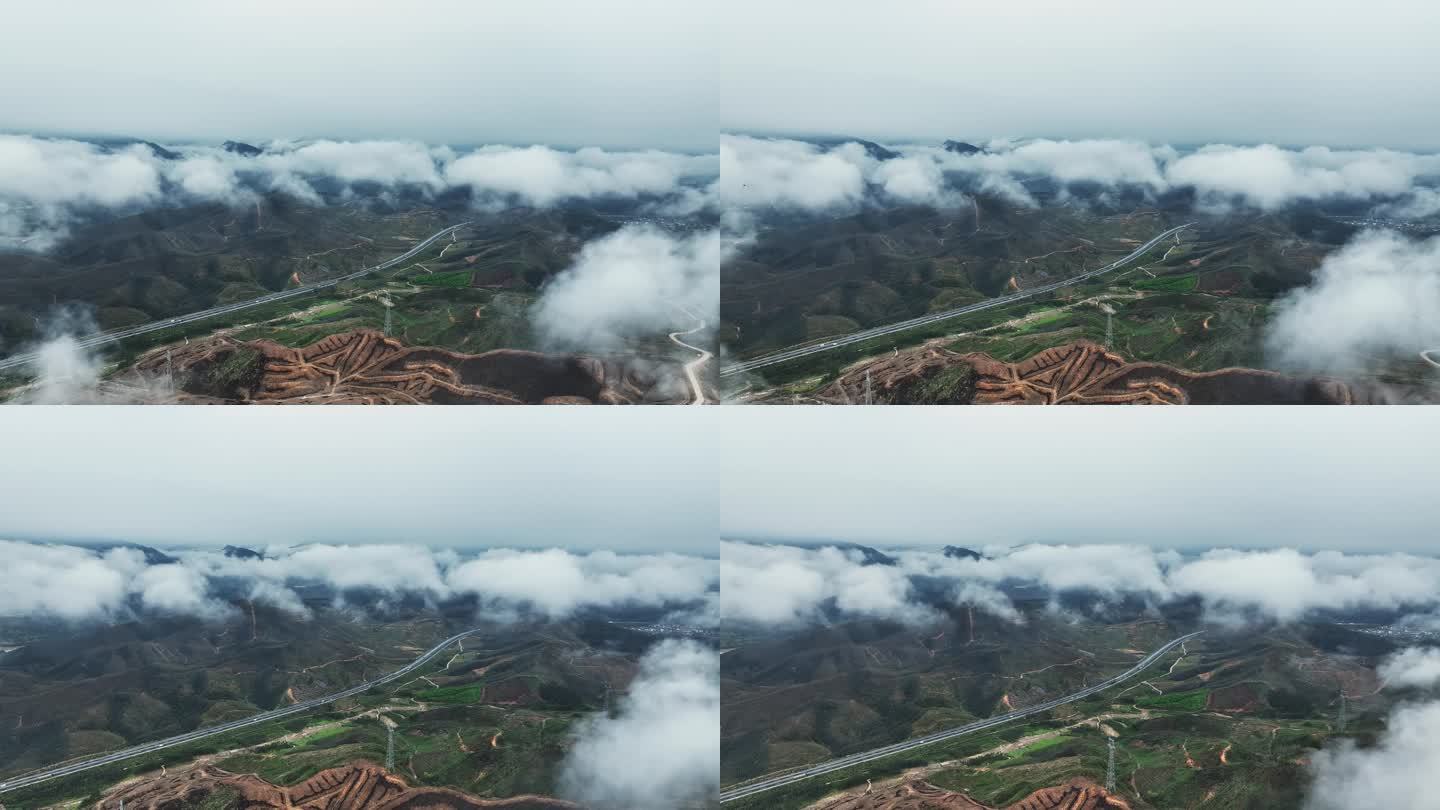 春天桂林山区雨后云雾缭绕中的高速公路