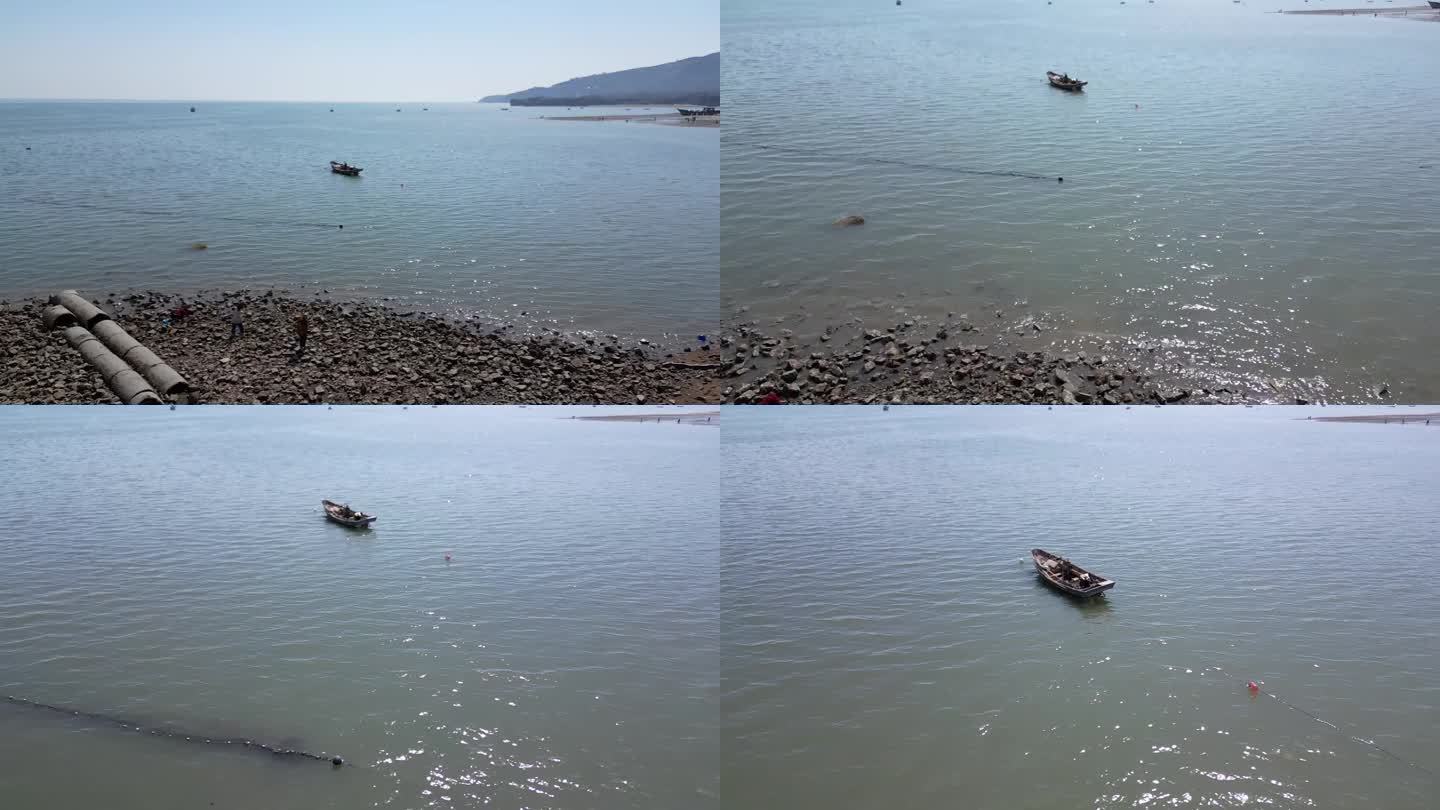 航拍葫芦岛渤海海平面渔船海浪波光粼粼