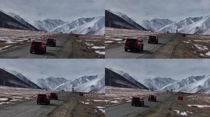 4K航拍坦克300越野车行驶在雪地的甘孜