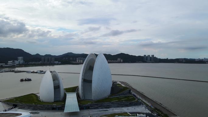 航拍珠海旅游海边地标建筑大剧院