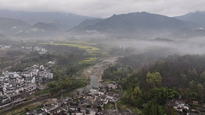 航拍晨雾中的黄山宏村