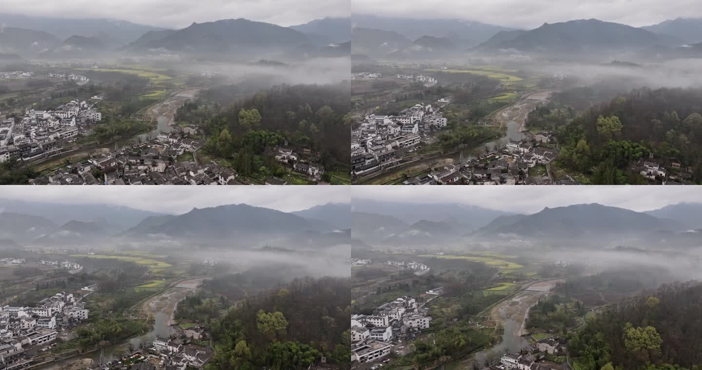 航拍晨雾中的黄山宏村