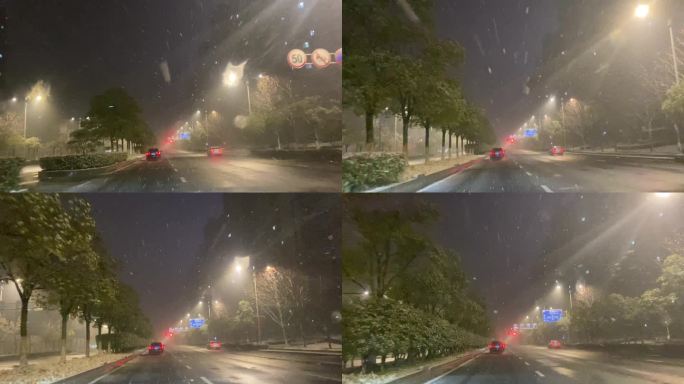 城市夜晚下雪行车视角