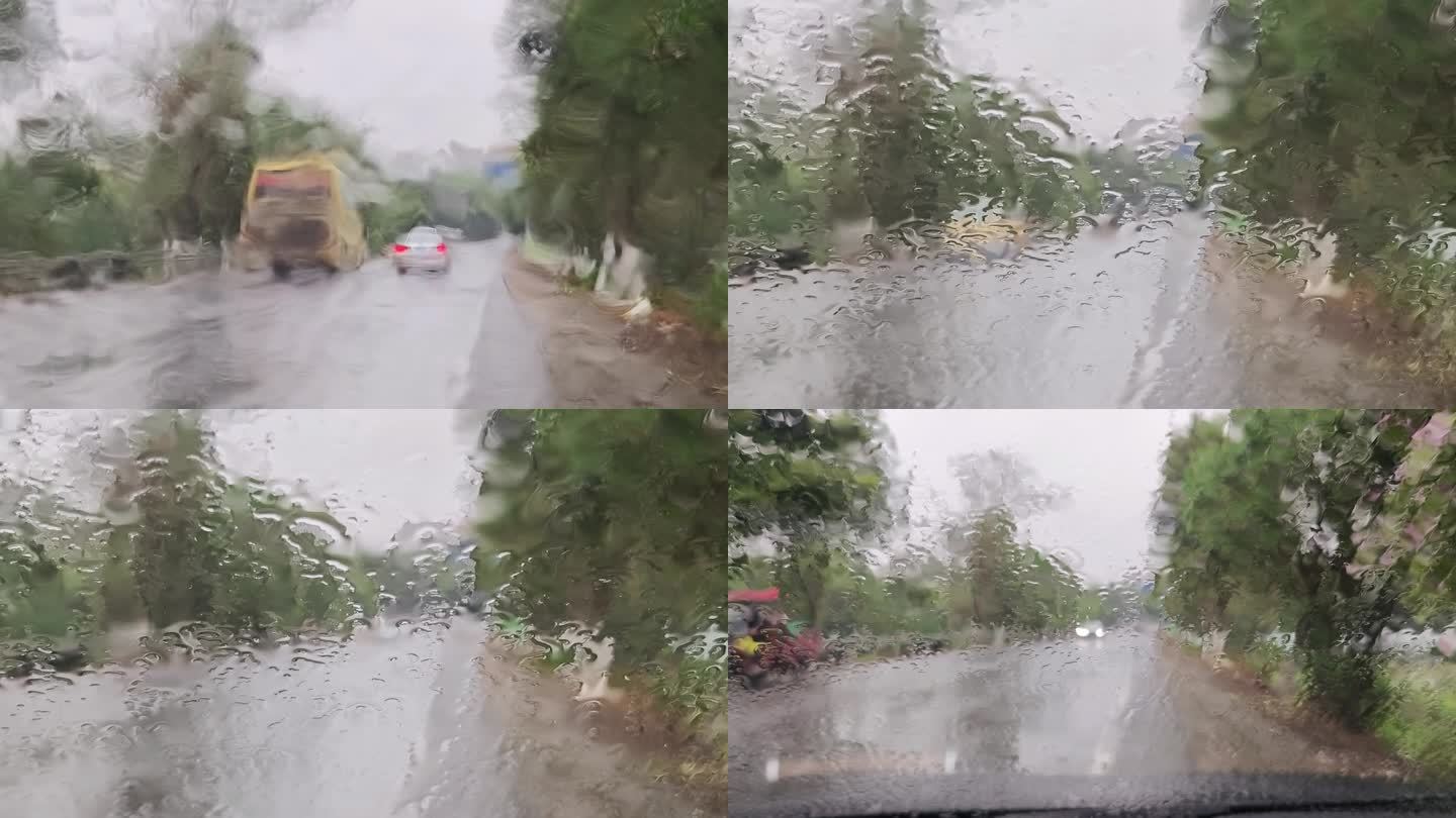 雨点打在光斑 车辆尾灯 汽车窗上雨滴下雨