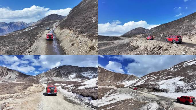 4K航拍坦克300越野车行驶在雪地的甘孜