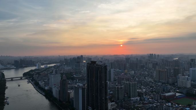 航拍广东省广州市海珠区滨江日落城市景观