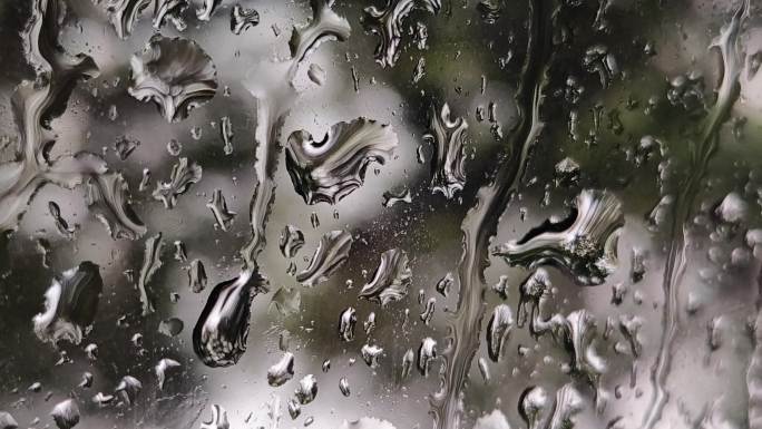 窗外的雨 窗户水珠下雨天光斑窗上雨滴下雨