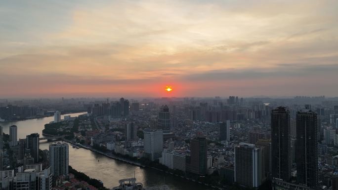 航拍广东省广州市海珠区滨江日落城市景观