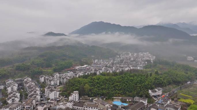 航拍晨雾中的黄山宏村