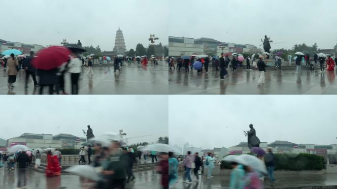 大雁塔玄奘雕像雨天西安游客