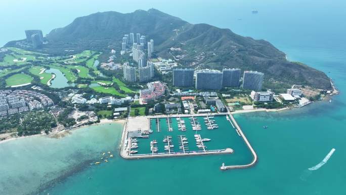 海南三亚半山半岛帆船港航拍海岸线山与海