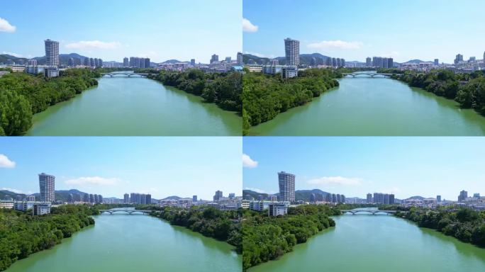 海南省三亚市蓝天白云下的三亚河月川桥