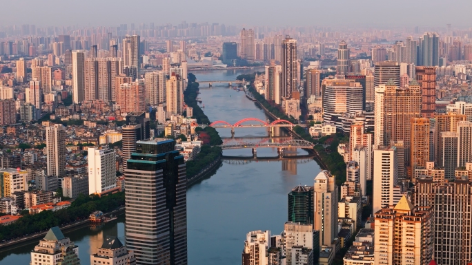【4K】航拍日出河流穿过城市朝阳建筑桥梁
