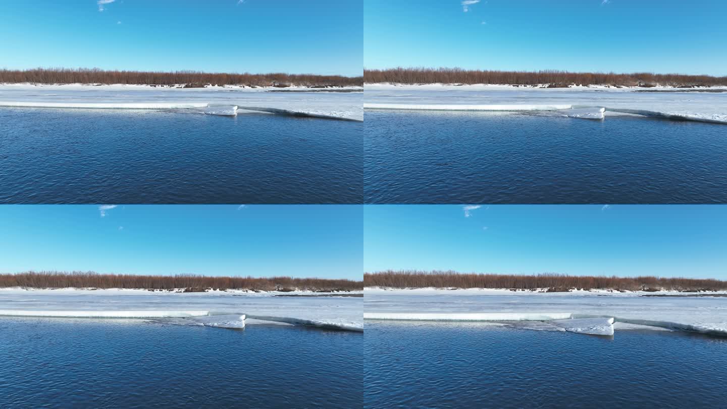 呼伦贝尔早春冰雪消融的河流