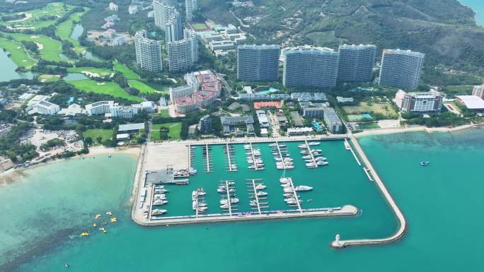海南三亚半山半岛帆船港航拍海岸线山与海