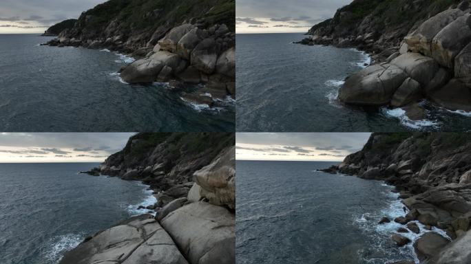 海上日出礁岬角峭壁海浪