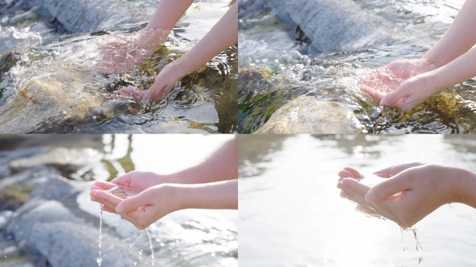 双手捧起清澈的溪水泉水河水