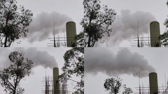 烟囱冒烟工厂烟囱蒸汽烟雾蒸汽缭绕流走黑云