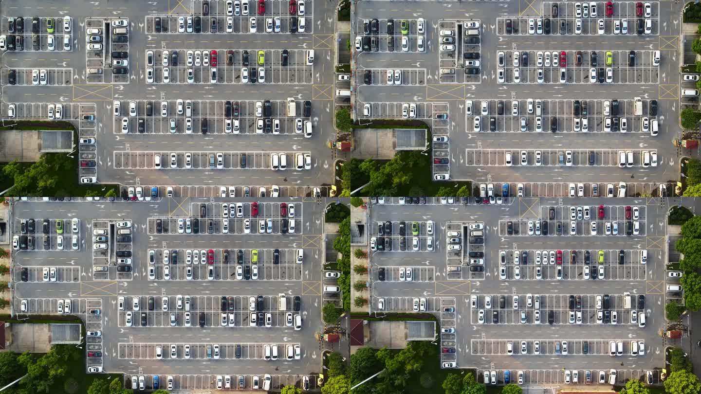 航拍城市商业地产公共停车场停放的车