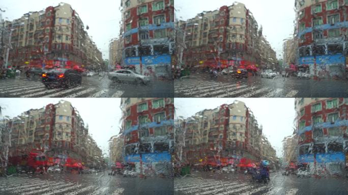 下雨天车窗外街景雨天道路交通车流窗户风景