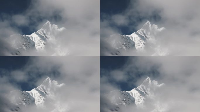 云雾间的雪山 神女峰