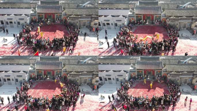 广东东莞：村民在祠堂前表演麒麟舞庆祝春节